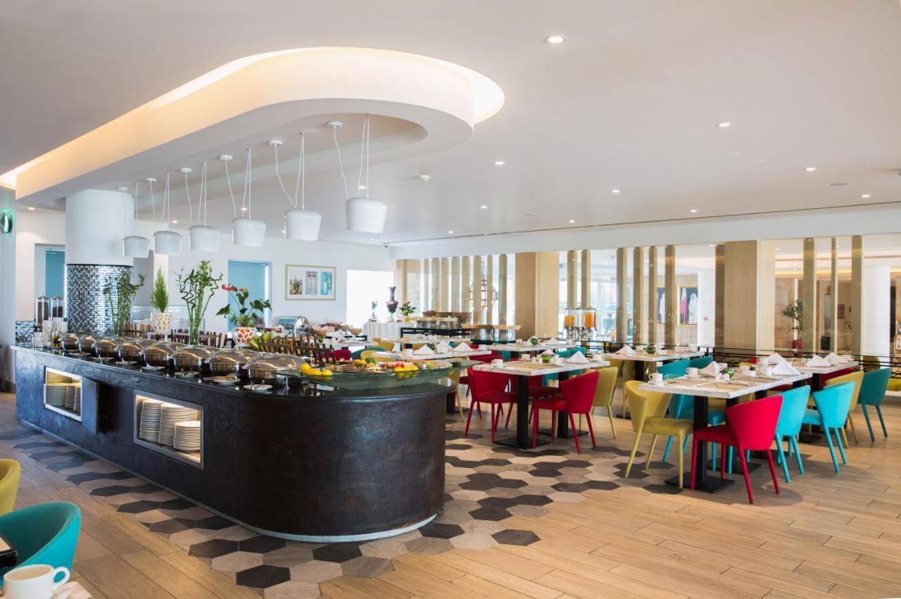 海岸线海滩穆尔瓦度假村 乌姆赛义德 外观 照片 The restaurant
