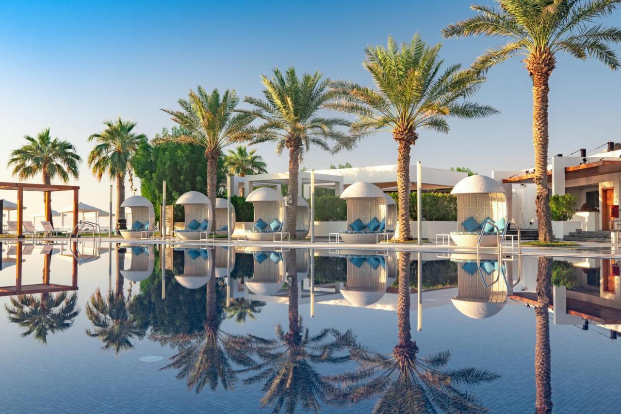 海岸线海滩穆尔瓦度假村 乌姆赛义德 外观 照片 The Cove Rotana Resort