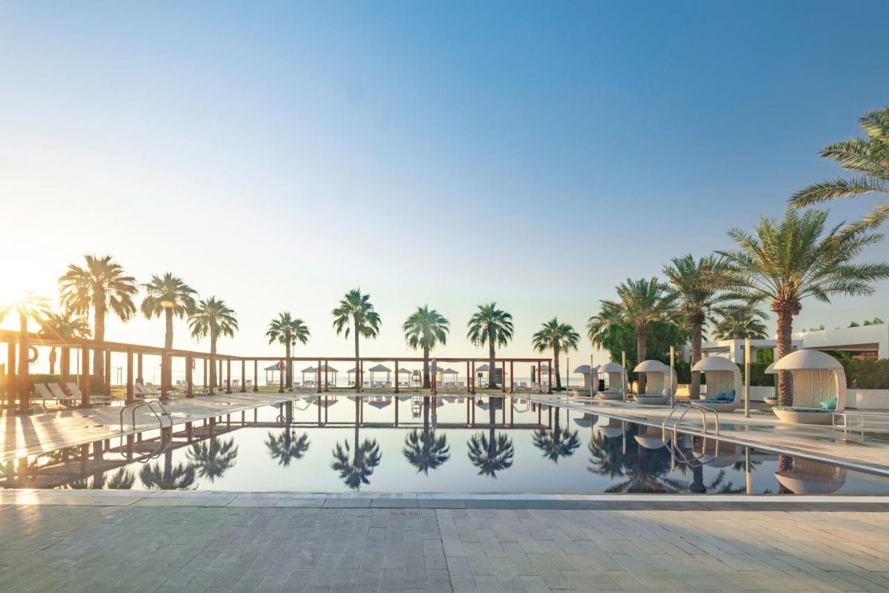 海岸线海滩穆尔瓦度假村 乌姆赛义德 外观 照片 The resort's main pool