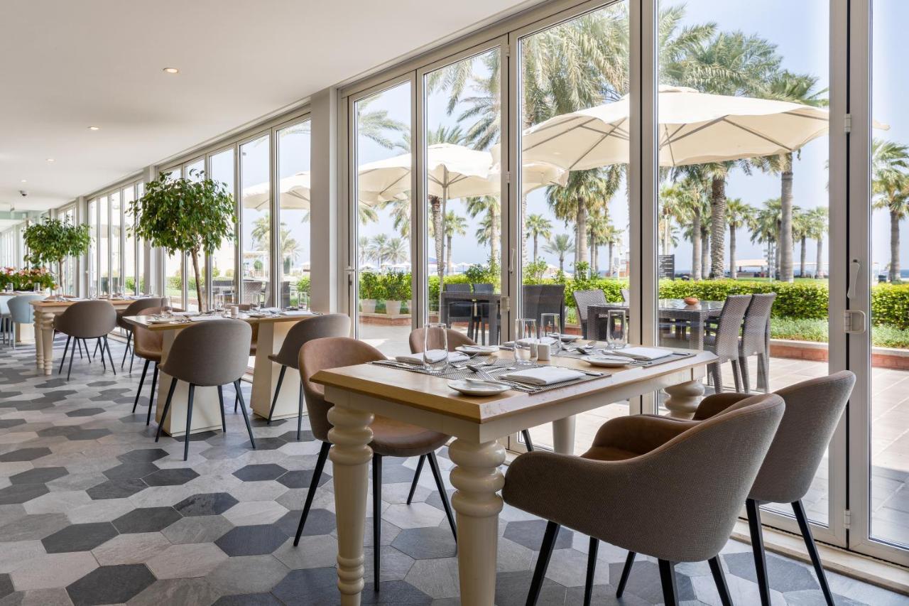 海岸线海滩穆尔瓦度假村 乌姆赛义德 外观 照片 Restaurant