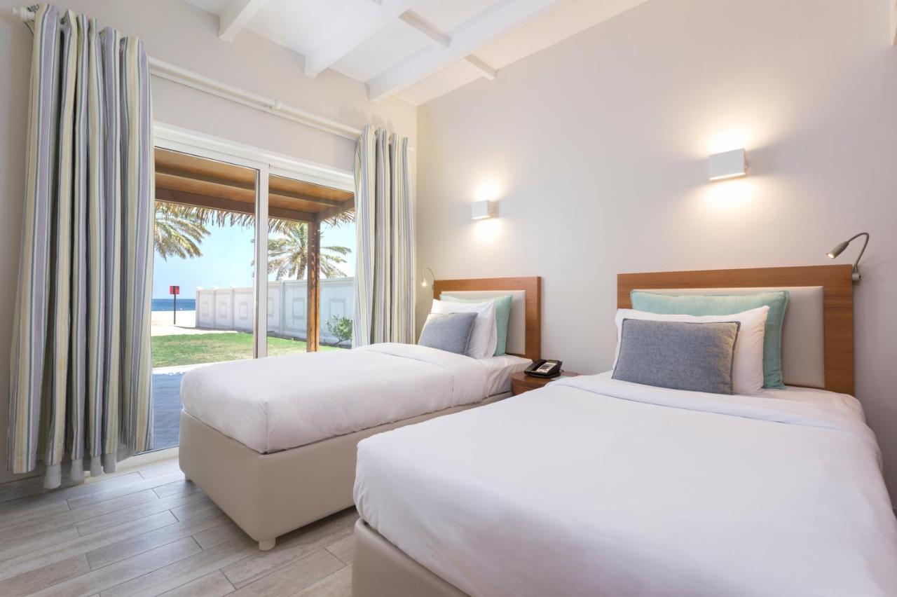 海岸线海滩穆尔瓦度假村 乌姆赛义德 外观 照片 Deluxe Beach Villa